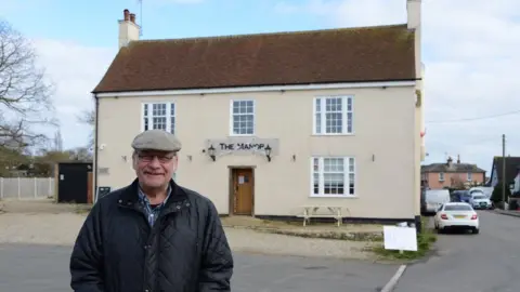 Paul Withams Roger Frere outside pub