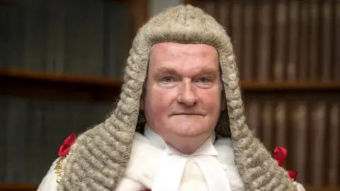 PA Media Lord Burnett