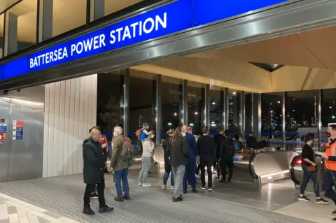 First passengers at Battersea Power station