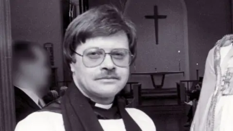 SWNS Trevor Devamanikkam