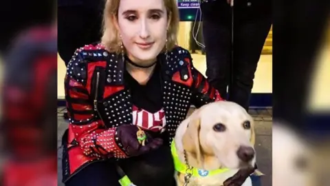 Kimberley Burrows Tami next to Kimberley before a Ghost concert