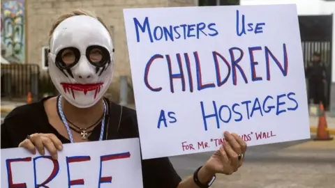 EPA An activist protests against US President Donald Trump and the separation of immigrant children from their parents at the US consulate in the city of Merida, Yucatan, Mexico, 21 June 2018.