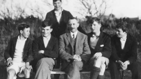 Sherborne School Archives Alan Turing (second from left) in Rock, Cornwall, in 1930 with fellow Sherborne School pupils