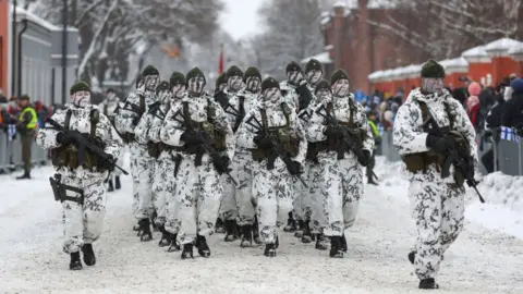 SOPA Images Soldiers of the Finnish Armed Forces are seen marching during the Independence Day parade in Hamina city