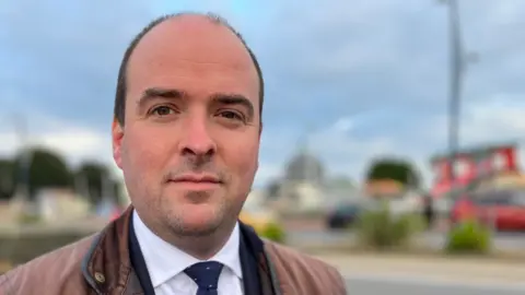 Shaun Whitmore/BBC Richard Holden