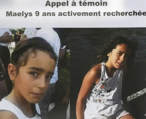 AFP A photo taken on 28 August 2017 shows an appeal for witnesses poster for Maëlys, a nine-year-old girl who disappeared during a wedding party on 26-27 August in Pont-de-Beauvoisin, eastern France