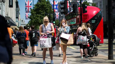 Getty Images Shoppers on Oxford Street