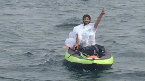 Prefecture Maritime de la Manche Migrant on board a kayak