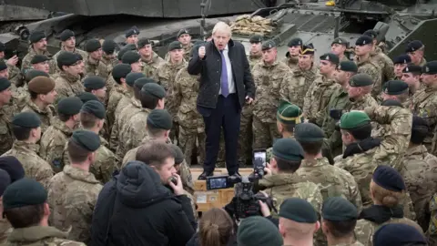 PA Media Prime Minister Boris Johnson speaks to British troops stationed in Estonia during a one-day visit to the Baltic country.