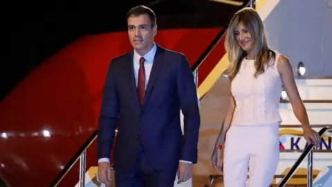 Reuters Prime Minister Pedro Sánchez (left) and his wife Begoña Gómez. Photo: June 2019