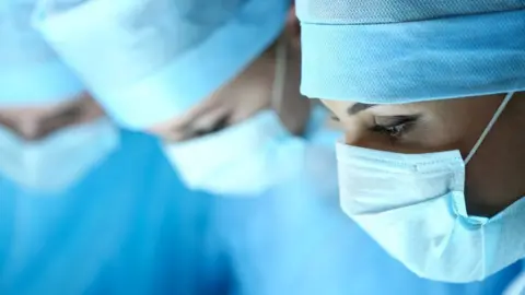 Getty Images Surgeons