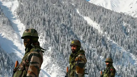 Getty Images Indian soldiers near Zojila mountain pass which connects Srinagar to the union territory of Ladakh, bordering China on February 28, 2021