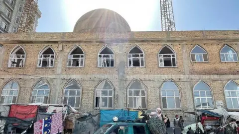 Anadolu Agency via Getty Images A view from the Seh Dokan mosque after a blast that hit the mosque located in a busy area of Mazar-i-Sharif, Afghanistan April 21, 2022