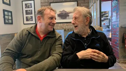 Rhian Collinson Kevin Collinson looking at dad John Collinson, known as Rick