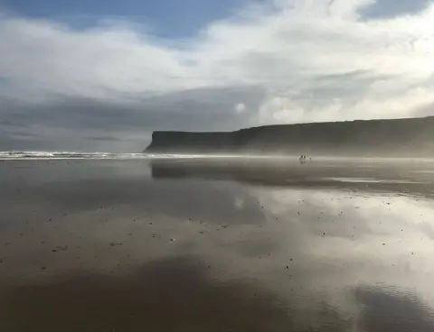 Adele Tempest-Greenough Morning sun reflected over a beach