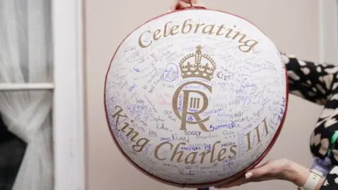 PA Media The Atherstone Ball Game ball filled with signatures