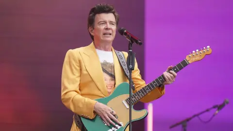 PA Rick Astley performed wearing a Kylie t-shirt