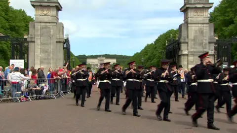 Flute band leaving Stormont