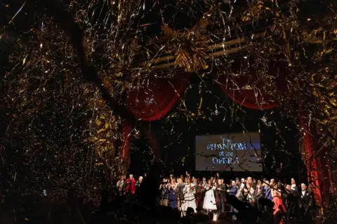 Caitlin Ochs / Reuters Cast and crew members take a final bow