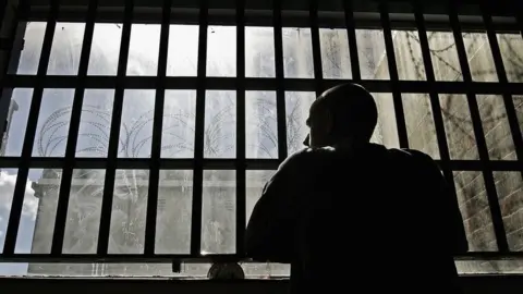 Getty Images Man in prison