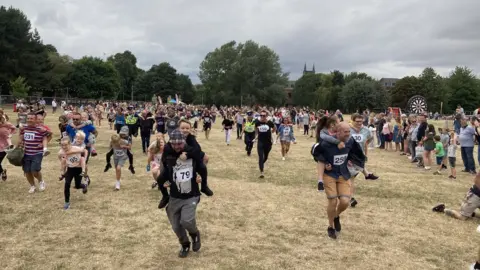 Tamworth Borough Council Residents taking part in the piggyback challenge