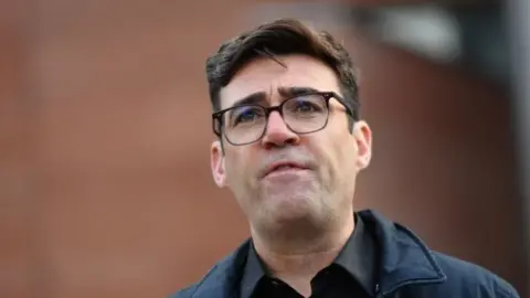 PA Media Andy Burnham