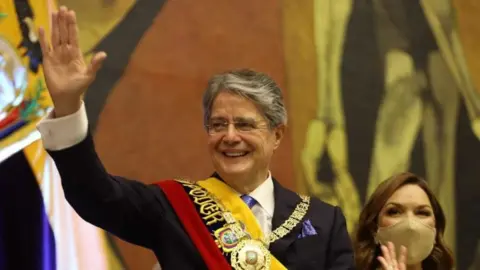 Ecuador Presidency Ecuador's President-elect Guillermo Lasso takes oath of office at the National Assembly during his Inauguration ceremony in Quito, Ecuador on May 24, 2021. (Photo by Ecuador Presidency/Anadolu Agency via Getty Images)