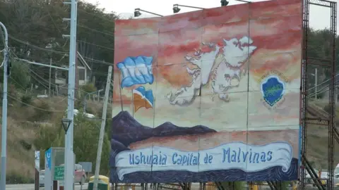 A sign labelling Ushuaia as the capital of the Malvinas