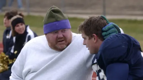 Getty Images Ex-wrestler Leon White pictured with his son Jesse in 2004