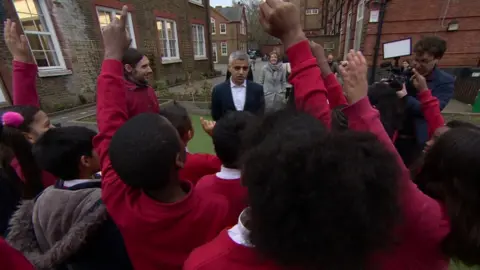 Sadiq Khan and school children