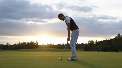 Getty Images Stock image of a man golfing