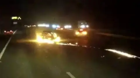 John Rastrick Burning car