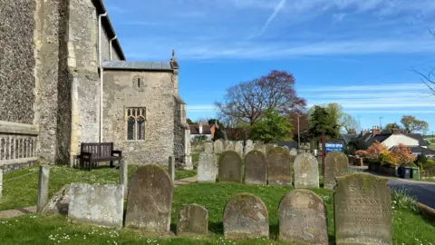 LDRS The graveyard at St Margaret's church on a sunny day