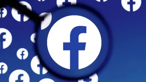 Getty Images Facebook logo under a magnifying glass