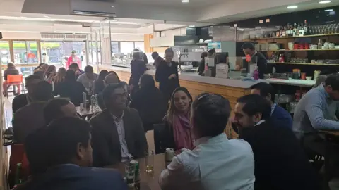 BBC Customers at Andres Cohen's cafe in Santiago, Chile