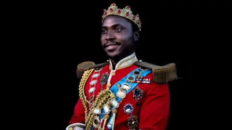 AFP Mandla Mvubu poses for a portrait during the 2018 edition of the Vodacom Durban July horse races in Durban, on 7 July 2018.