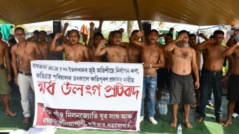 Getty Images Men in Assam demanding compensation for the Baghjan fire