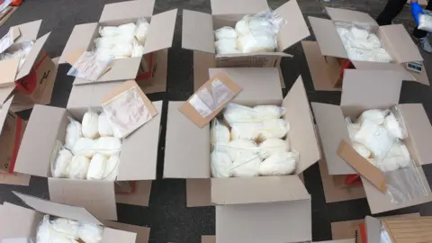 NSW POLICE Cardboard boxes containing packaged bags of meth