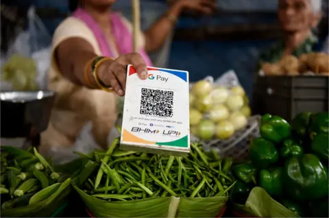 Getty Images UPI (Universal Payments Interface) code is seen in a vegetable shop in Mumbai, India, 01 August, 2022.