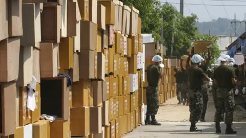 Getty Images Hundreds of coffins waiting to be used inside the temple Wat Yan Yao temple,