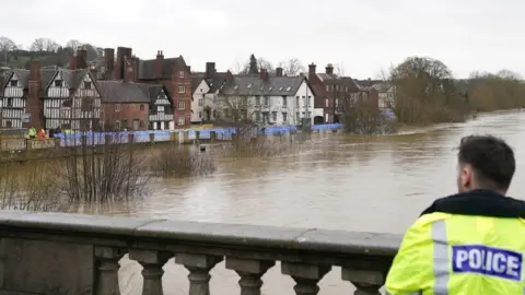 PA Media Emergency service on a bridge over the River Severn in Bewdley, Worcestershire