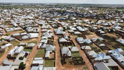 Gift Ufuoma/BBC Aerial view of a settlement