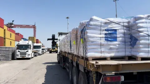 Israel Defense Forces UN World Food Programme lorries transport flour for Gaza from Israel's Ashdod container port (17 April 2024)