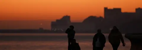 Getty Images Migrants on the British coast