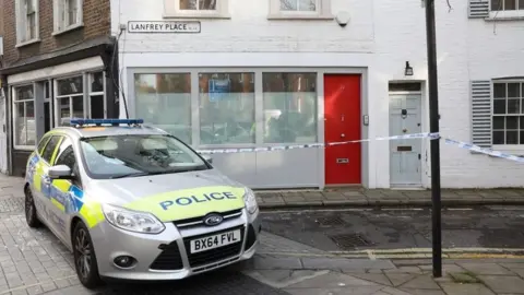 PA Media Police at murder scene