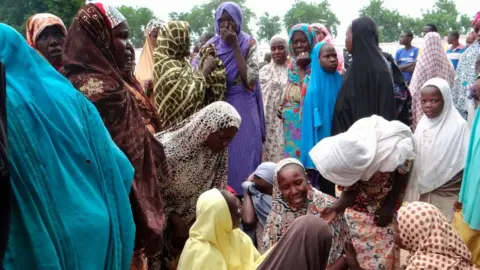 AFP Mourners react on July 24, 2017, in the Dalori IDP (Internally Displaced People) camp outside Maiduguri, after a suicide bomb attack that killed four