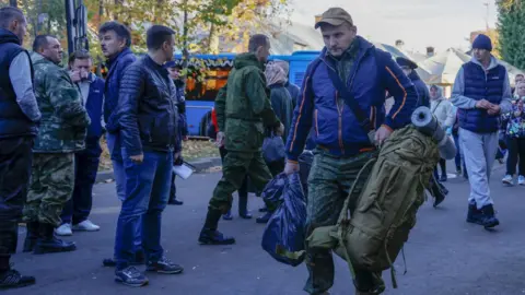 Getty Images Russian men mobilised to fight in Ukraine