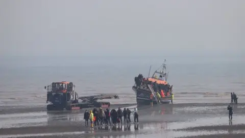 BBC Migrants arriving in Dungeness Thursday.