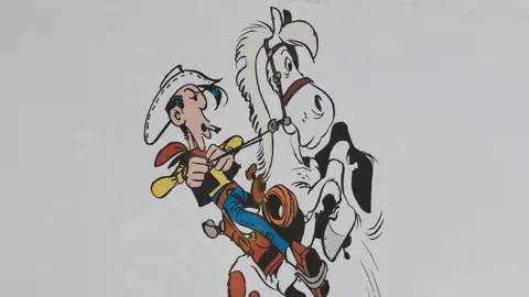 AFP/Getty Images An illustration of cartoon cowboy Lucky Luke on his horse