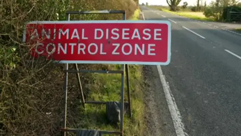 BBC Animal disease control zone sign.